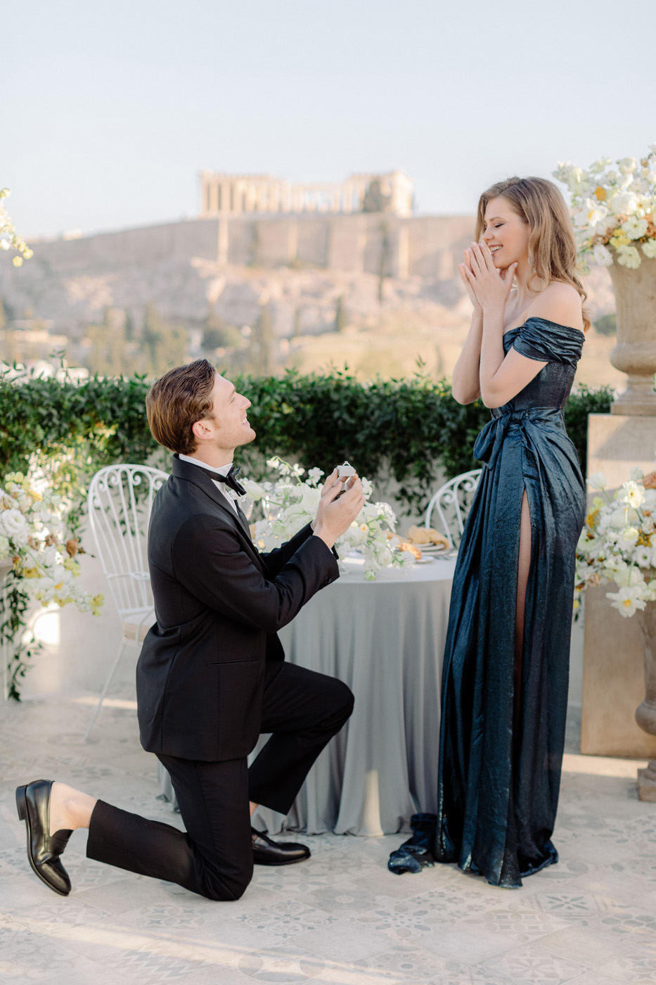 Wedding proposal in Athens when he gives her the ring with Acropolis view
